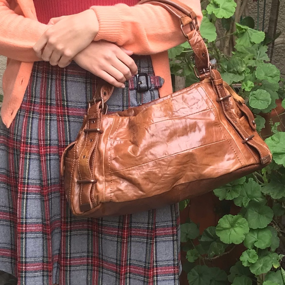 Vintage reddish brown BCBGMAXAZRIA large distressed leather bag